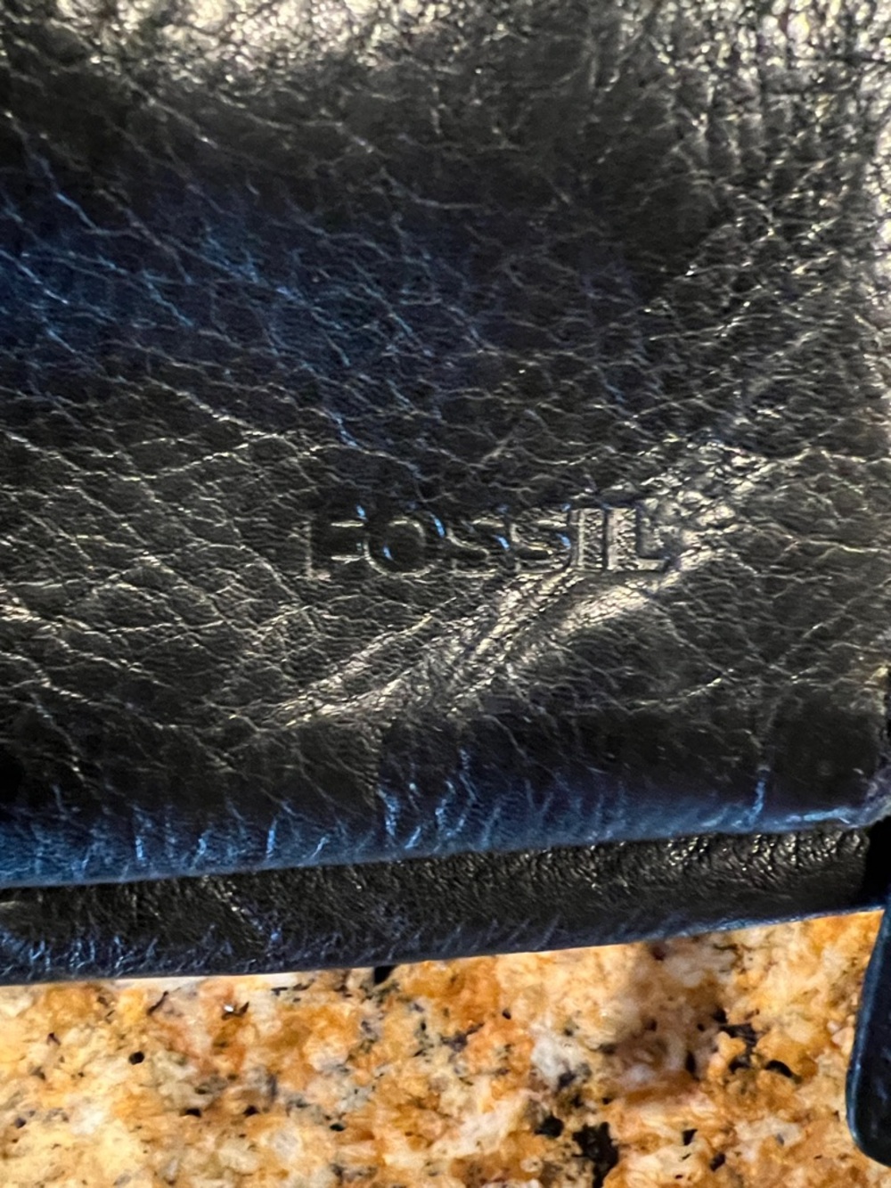 Fossil Black Leather Bifold Wallet with Embossed Logo